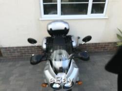 Triumph Tiger silver side panniers and set top box